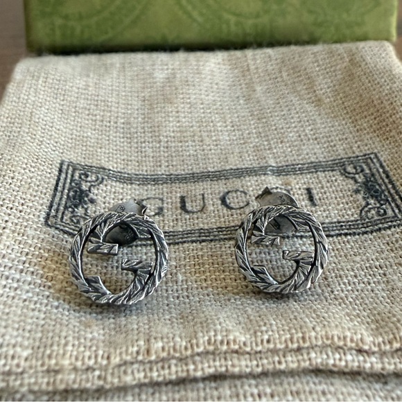 Gucci Jewelry - Stud Earrings With Interlocking G Motif in Aged Sterling Silver